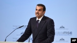 The Emir of Qatar, Sheikh Tamim bin Hamad Al Thani, delivers a speech at the International Security Conference in Munich, Germany, Friday, Feb. 16, 2018. 
