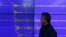 Yun Won-tae of the Korea Meteorological Administration stands in front of a screen showing seismic waves that were measured in Seoul after North Korea said it had conducted a powerful hydrogen bomb test, Dec. 6, 2015.