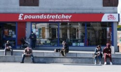 People practice social distancing in Woolwich as the spread of the coronavirus disease continues, in London, April 4, 2020.