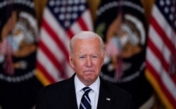 President Joe Biden delivers remarks on the coronavirus response and vaccination program during a speech in the East Room at the White House in Washington, Aug. 18, 2021.