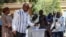 Prime Minister of Chad Saleh Kebzabo casts his vote at a polling station during the constitutional referendum in N'Djamena, on Dec. 17, 2023.