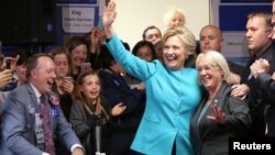 U.S. Democratic presidential nominee Hillary Clinton greets people at a campaign office in Seattle, Washington, Oct. 14, 2016. 