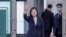 FILE - In this photo released by the Taiwan Presidential Office, Taiwan's President Tsai Ing-wen waves as she departs Taiwan, Sept. 5, 2023.