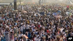 Worshippers gather at Ndolo airport for a Holy Mass with Pope Francis in Kinshasa, Congo, Feb. 1, 2023. 