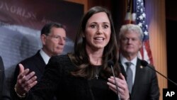 FILE - U.S. Senator Katie Britt speaks about the Laken Riley Act when it was still a proposal in Washington, Jan. 9, 2025. On Wednesday, the U.S. House approved the legislation, which requires the detainment of unauthorized migrants accused of theft and violent crimes.