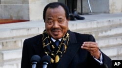 FILE - Cameroon's President Paul Biya addresses reporters following his meeting with French President Francois Hollande at the Elyse Palace in Paris, Jan 30, 2013. 