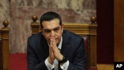 Greek Prime Minister Alexis Tsipras attends a parliamentary session in Athens, Jan. 16, 2019. 