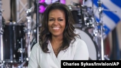  FILE - Michelle Obama participates in the International Day of the Girl on NBC's "Today" show in New York, Oct. 11, 2018. 