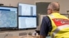 A member of the Incident Management Team coordinates the search for a radioactive capsule that was lost in transit, at the Emergency Services Complex in Cockburn, Australia, in this undated handout photo. (Department of Fire and Emergency Services/Handout via Reuters) 