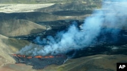 An aerial shot shows activity from the Fagradalsfjall volcano in Iceland, Aug. 3, 2022, some 32 kilometers southwest of the capital of Reykjavik and close to the international Keflavik Airport.
