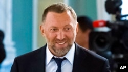FILE - Russian metals magnate Oleg Deripaska attends a meeting of Russian President Vladimir Putin and Turkish President Recep Tayyip Erdogan, outside St. Petersburg, Russia, Aug. 9, 2016. 