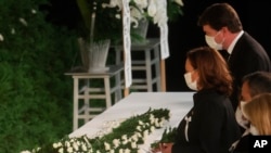 U.S. Vice President Kamala Harris lays flowers during the state funeral for former Prime Minister Shinzo Abe, Sept. 27, 2022, in Tokyo. Abe was assassinated in July.