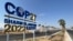 View of a COP27 sign on the road leading to the conference area in Egypt's Red Sea resort of Sharm el-Sheikh, Oct. 20, 2022.