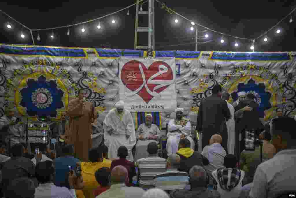 Amid debt and cost-of-living crises, Muslims gather ahead of Mawlid al-Nabi, the celebration of the birth of the Prophet Mohammed in the village of Al-Sherif, Egypt about 120 kilometers south of Cairo, Oct. 4, 2022. (Hamada Elrasam/VOA)