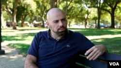 Russian investigative journalist Mikhail Rubin