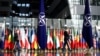 The national flags of the members North Atlantic Treaty Organization(NATO) are seen ahead of a two-day meeting of the alliance's Defence Ministers at the NATO Headquarter in Brussels, Oct. 12, 2022. 