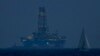 FILE - An offshore drilling rig is seen in the waters off Cyprus' coastal city of Limassol, July 5, 2020.