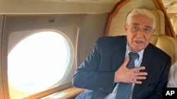 Baquer Namazi, an Iranian-American held by Iran leaves the country, Oct. 5, 2022, for Oman, officials said, after increasing pressure to free him amid his struggles with poor health. His 50-year-old son, however, remains in Iran. (Namazi family via AP)