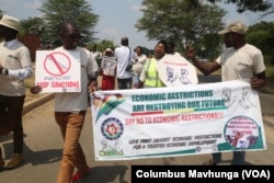 Broad Alliance Against Sanctions of Zimbabwe protesting at the the U. S. Embassy in Harare, Oct.19, 2022.