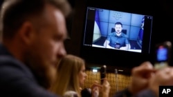 Ukrainian President Volodymyr Zelenskyy speaks during a video address to the European Council, Oct. 13, 2022, in Strasbourg, eastern France.