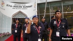 Police officers check security arrangements for the 27th Association of Southeast Asian Nations (ASEAN) summit in Kuala Lumpur, Malaysia, Nov. 20, 2015.
