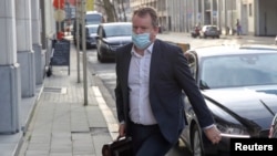 Britain's chief negotiator David Frost arrives to the UK Mission after the first session of Brexit negotiations at the European Commission headquarters, in Brussels, Belgium, Dec. 13, 2020. 