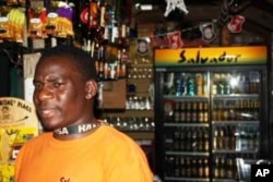 Emton Kalimanjira behind the bar at Kaapsche Hoop, South Africa...He enjoys meeting lots of "strange, but wonderful" people from all over the world here