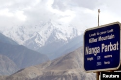FILE - A view of a snow-packed Nanga Parbat, the world's ninth highest peak, in northern Pakistan, July 14, 2004.