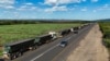 A drone view shows stranded trucks at the side of the road, near the Lebombo border outside Mbombela, South Africa, Nov. 29, 2024. Mozambique’s political instability has caused traffic congestion and delays at its borders, affecting trade. 