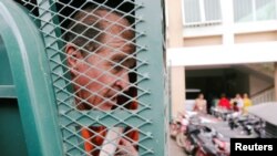 Australian filmmaker James Ricketson arrives at the Municipal Court of Phnom Penh, Cambodia, Aug. 23, 2018. 