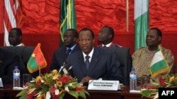 The president of Burkina Faso, Blaise Compaore, speaks during ECOWAS talks on Mali, July 7, 2012, in Ouagadougou. 