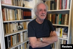 Scientist Pierre Agostini poses during an interview with Reuters after winning the 2023 Nobel Prize in Physics in Paris, France, October 3, 2023. (REUTERS/Clotaire Achi)