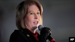 FILE - Attorney Sidney Powell, a member of then-President Donald Trump's legal team, speaks during a rally on Dec. 2, 2020, in Alpharetta, Georgia.