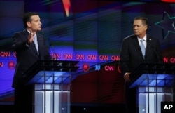 FILE - Republican presidential candidates, from left, Texas Senator Ted Cruz and Ohio Governor John Kasich participate in a Republican presidential debate at the University of Miami, in Coral Gables, Fla., March 10, 2016.