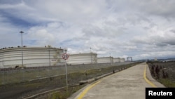 FILE - Oil tanks are seen at China's pipeline project on Madae island, Kyaukpyu township, Rakhine state, Myanmar, Oct. 7, 2015. 