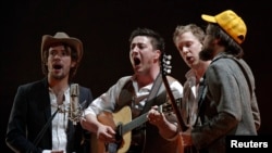 Mumford & Sons perform on stage during the BRIT music awards at the O2 Arena in London February 15, 2011.