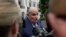 FILE - President Donald Trump's lawyer Rudy Giuliani speaks to reporters on the South Lawn of the White House in Washington, May 30, 2018.