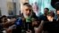 FILE - Revolutionary Guard aerospace division commander Gen. Amir Ali Hajizadeh speaks with media members as he arrives at a ceremony in Tehran, Iran, Nov. 13, 2023,