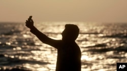 n this Feb. 22, 2016, photo, an Indian man takes a selfie in Mumbai's coastline. India is home to the highest number of people who have died while taking photos of themselves, with 19 of the world’s 49 recorded selfie-linked deaths since 2014,