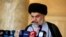 Iraqi Shi'ite cleric Muqtada al-Sadr delivers a sermon to worshippers during Eid al-Fitr prayers at the Kufa mosque near Najaf, June 5, 2019. 