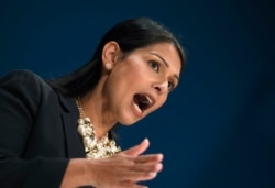 英国内政大臣普丽蒂·帕特尔(Priti Patel 又译彭黛玲)