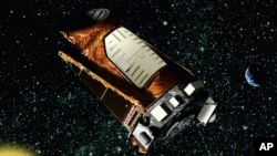 FILE - This artist's rendition provided by NASA shows the Kepler space telescope.