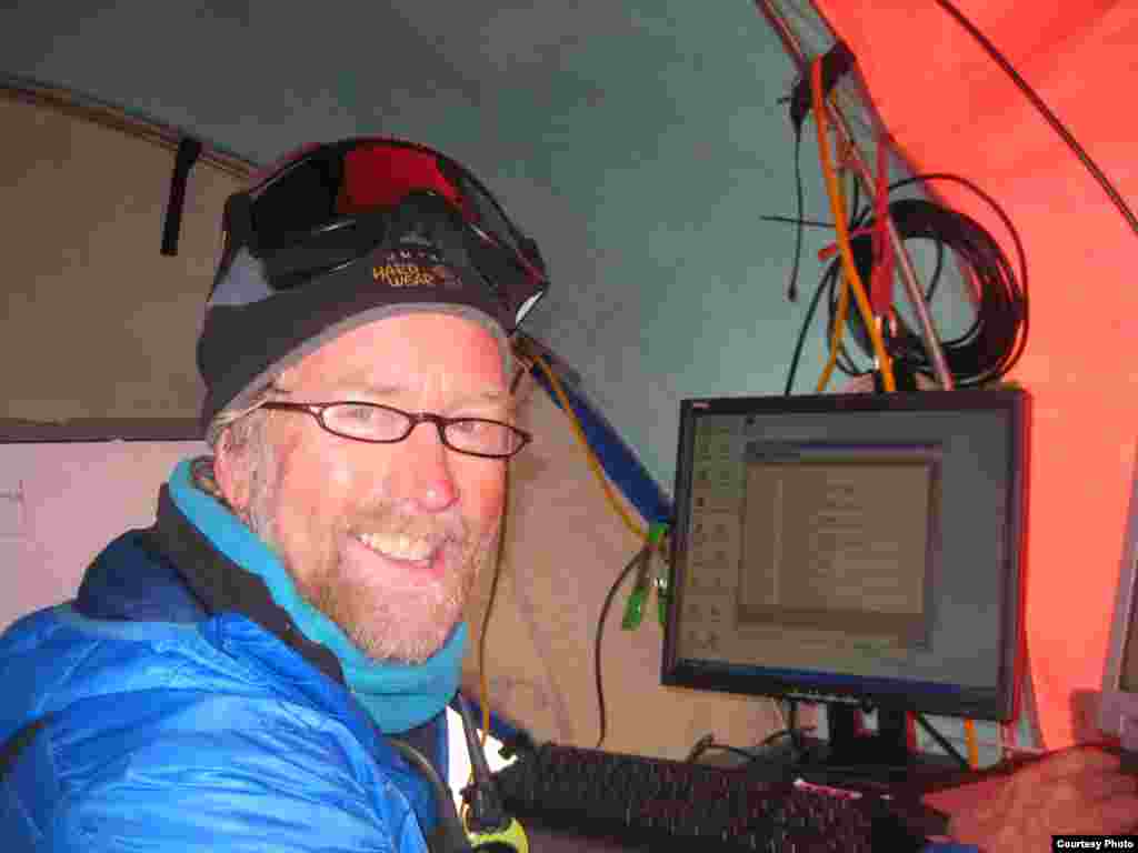 Scott Tyler monitors the temperature data in real time from fiber optic cables. (Victor Zagorodov) 