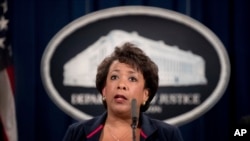 FILE - Attorney General Loretta Lynch speaks at a news conference, Sept. 22, 2016, at the Justice Department in Washington. The Justice Department is moving forward with its plans to collect data on how often law enforcement officers use force.