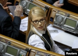 Ukrainian former Prime Minister and leader of Batkivshchyna (Fatherland) party Yulia Tymoshenko attends a parliament session in Kyiv, Ukraine, Feb. 16, 2016.