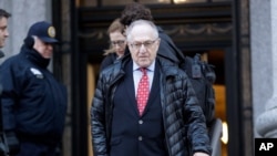 FILE - Attorney Alan Dershowitz leaves Manhattan Federal Court in New York, March 6, 2019. Dershowitz is among the lawyers representing President Donald Trump in his impeachment trial. 