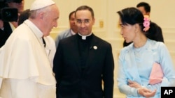 FILE - Pope Francis meets Myanmar's leader Aung San Suu Kyi in Naypyitaw, Myanmar, Nov. 28, 2017.