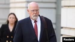 FILE - Special Counsel John Durham departs the U.S. Federal Courthouse in Washington, May 17, 2022. 