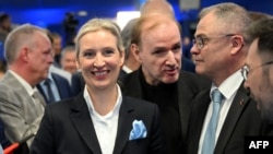 Co-leader of Germany's far-right Alternative for Germany (AfD) party Alice Weidel reacts with party members during the electoral evening in Berlin, Feb. 23, 2025.