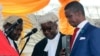 FILE - The Patriotic Front's Edgar Lungu, right, is sworn in as president at an inauguration ceremony in Lusaka, Jan. 25, 2015.